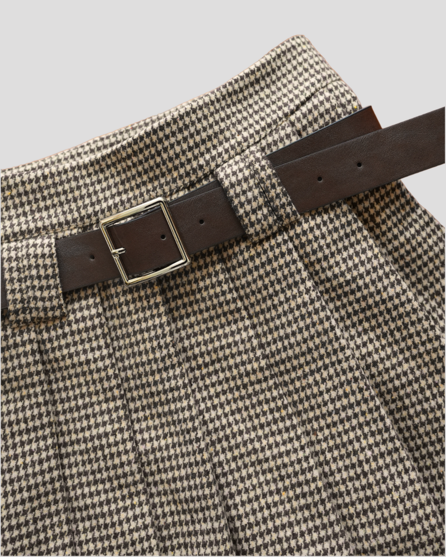 Houndstooth pleated mini skirt with belt