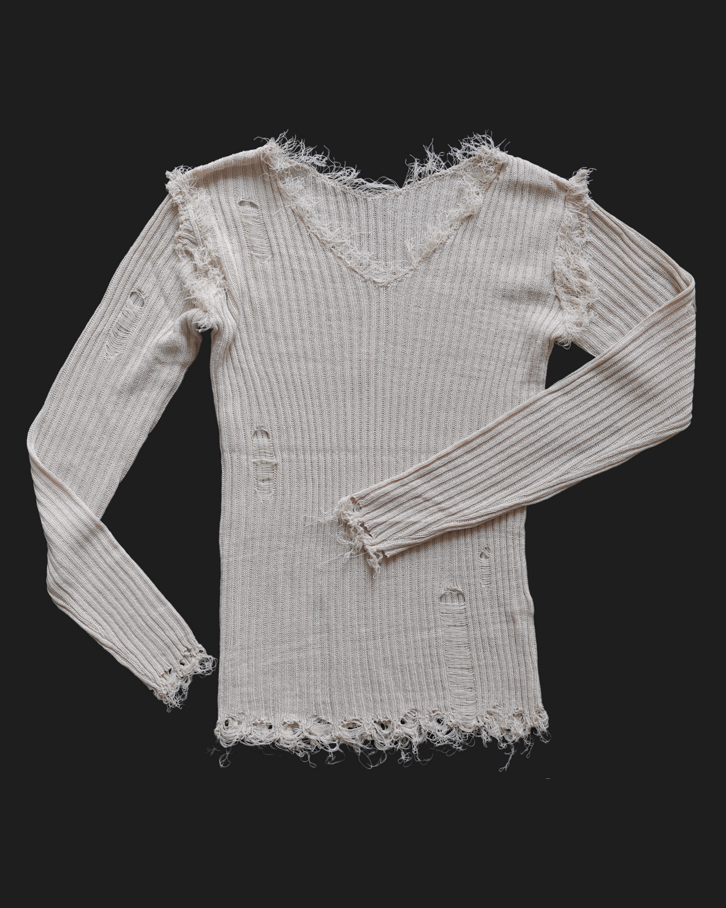 V-neck distressed knit top