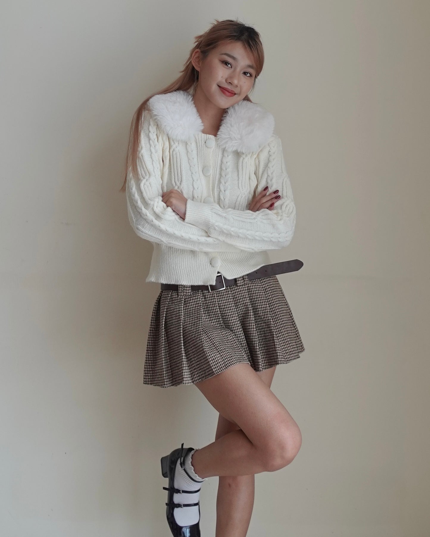 Houndstooth pleated mini skirt with belt