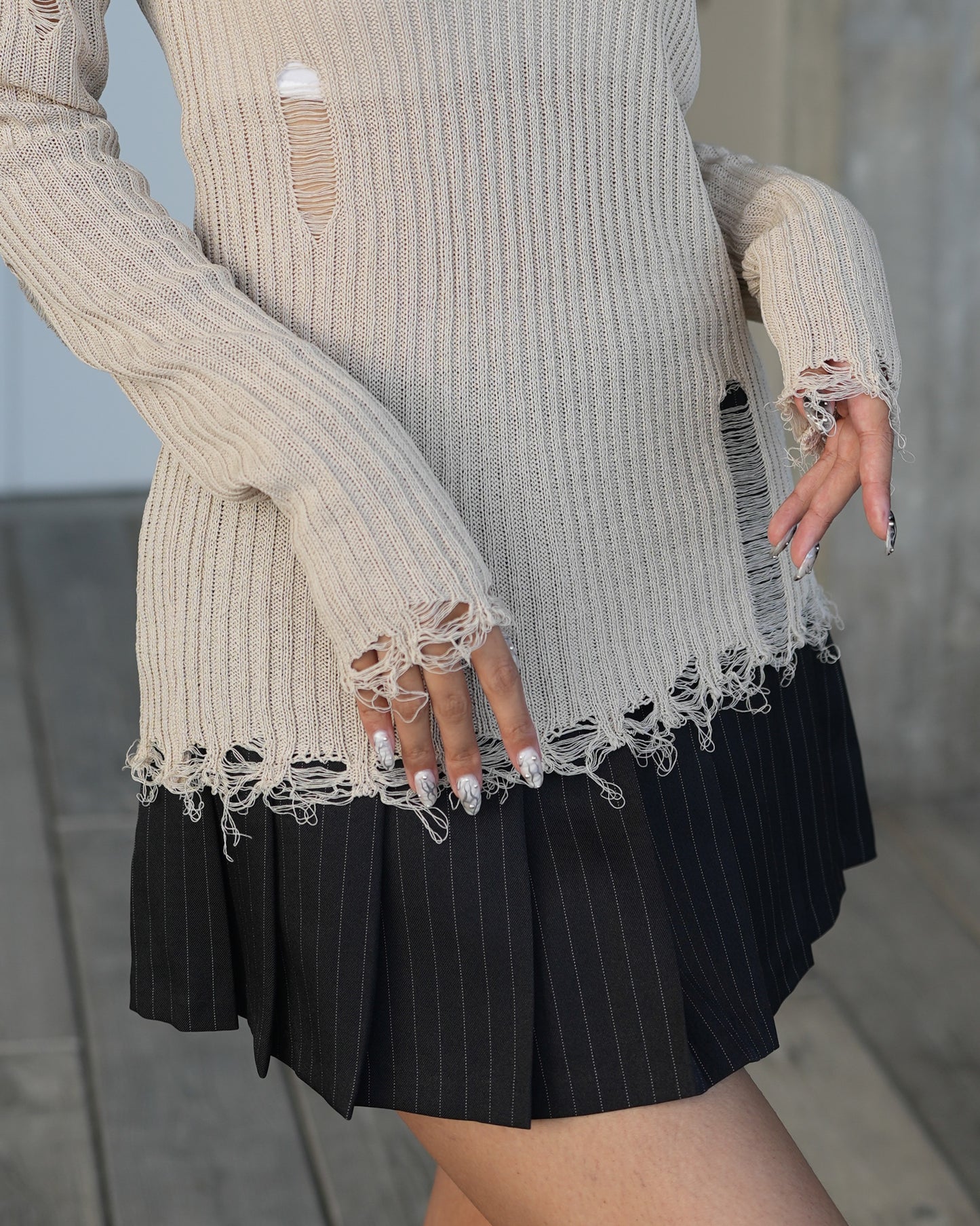 V-neck distressed knit top