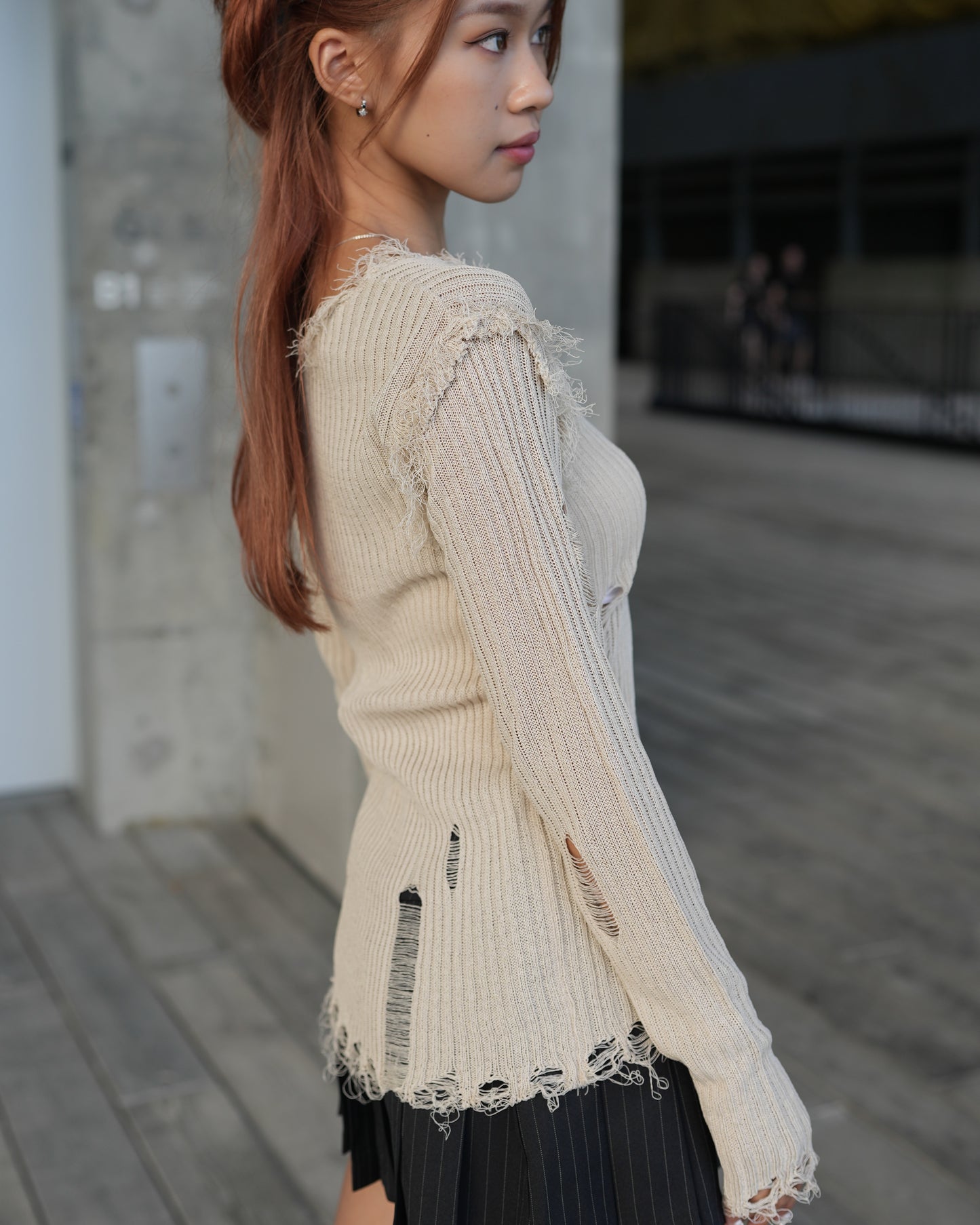 V-neck distressed knit top