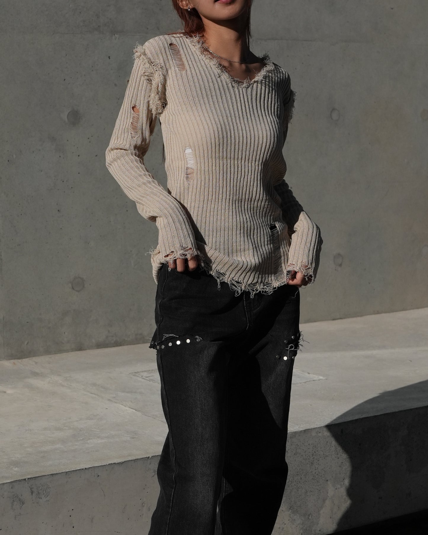 Raw edge cut out jeans