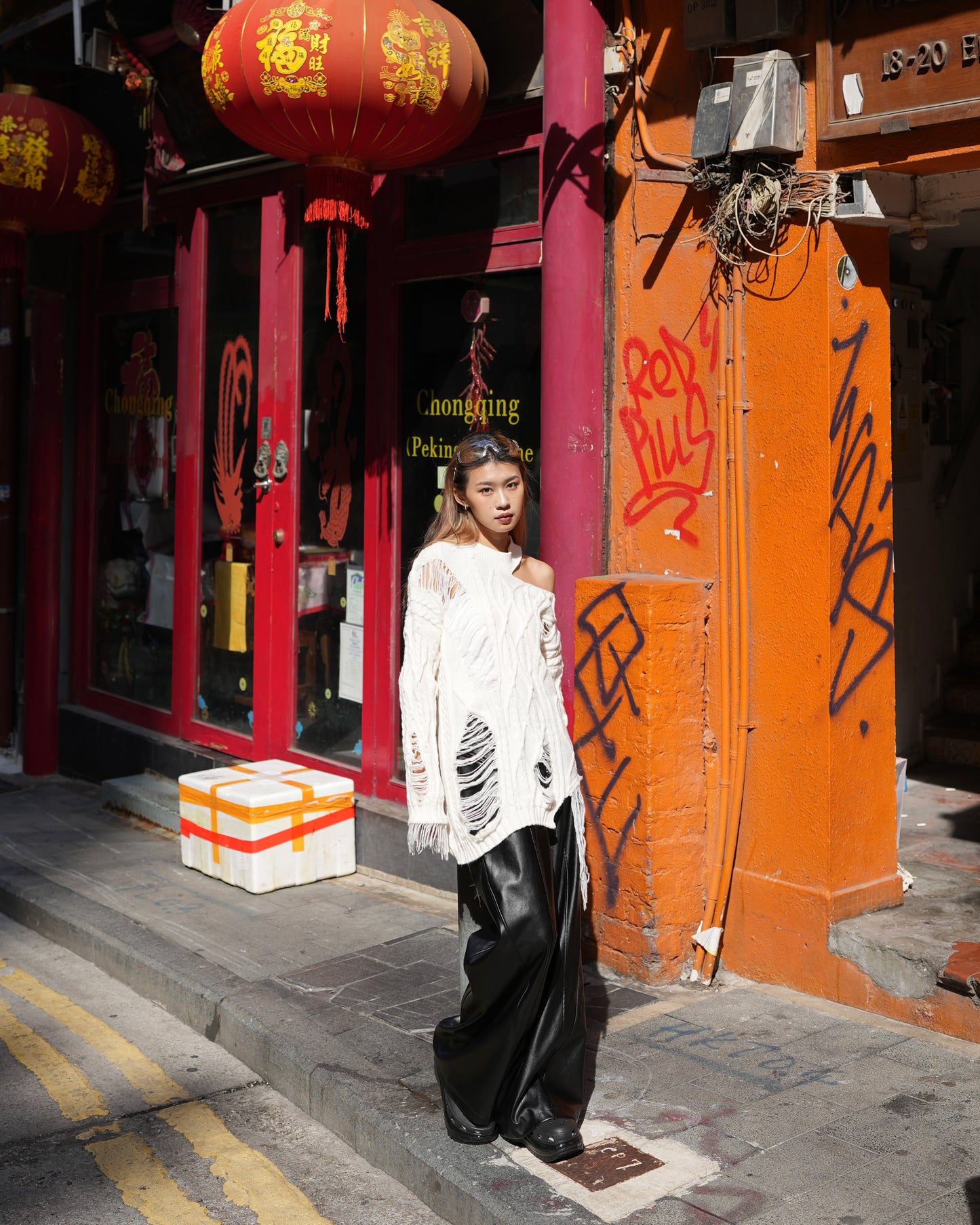 Cut out cable distressed sweater