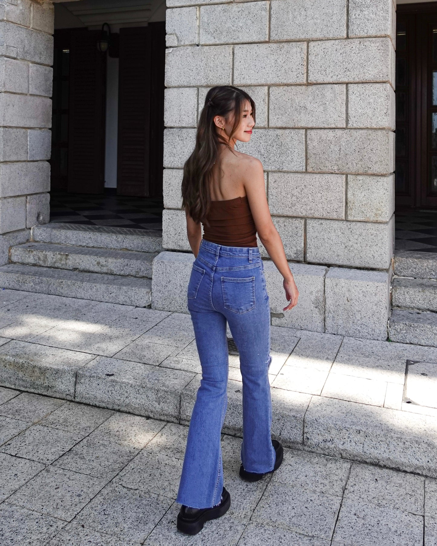 Distressed high-rise boot cut jeans