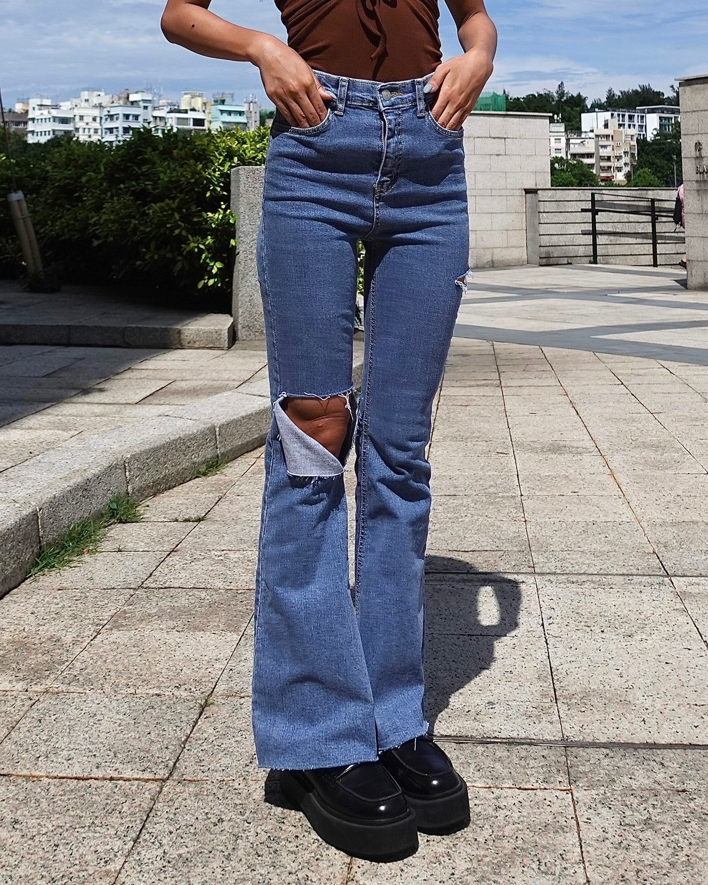 Distressed high-rise boot cut jeans