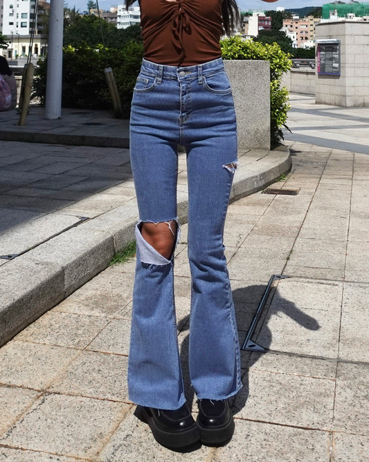 Distressed high-rise boot cut jeans
