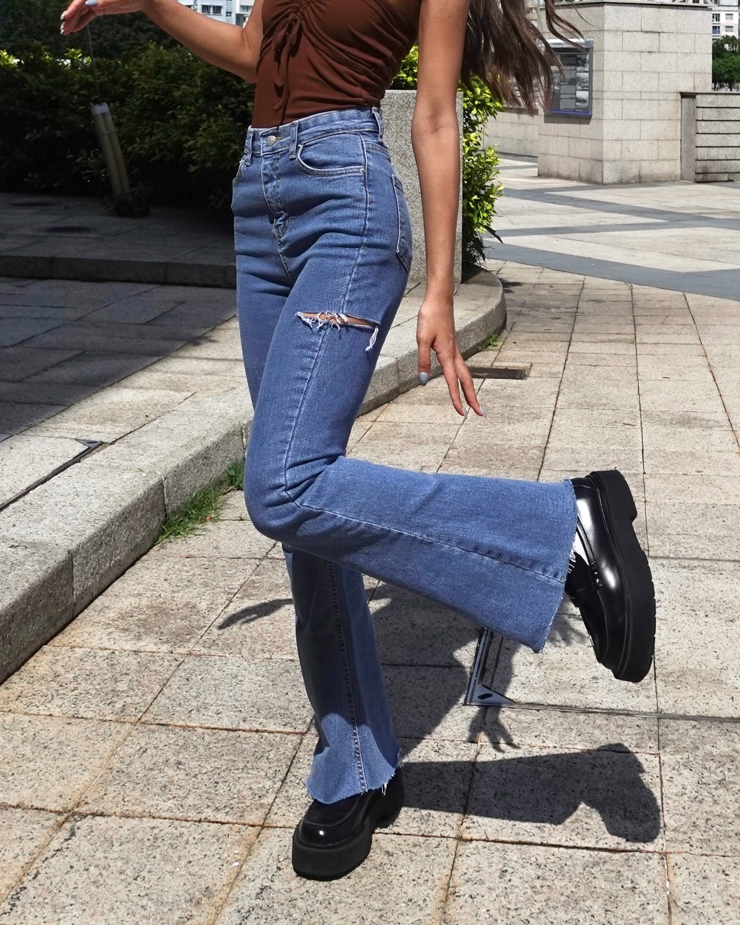 Distressed high-rise boot cut jeans