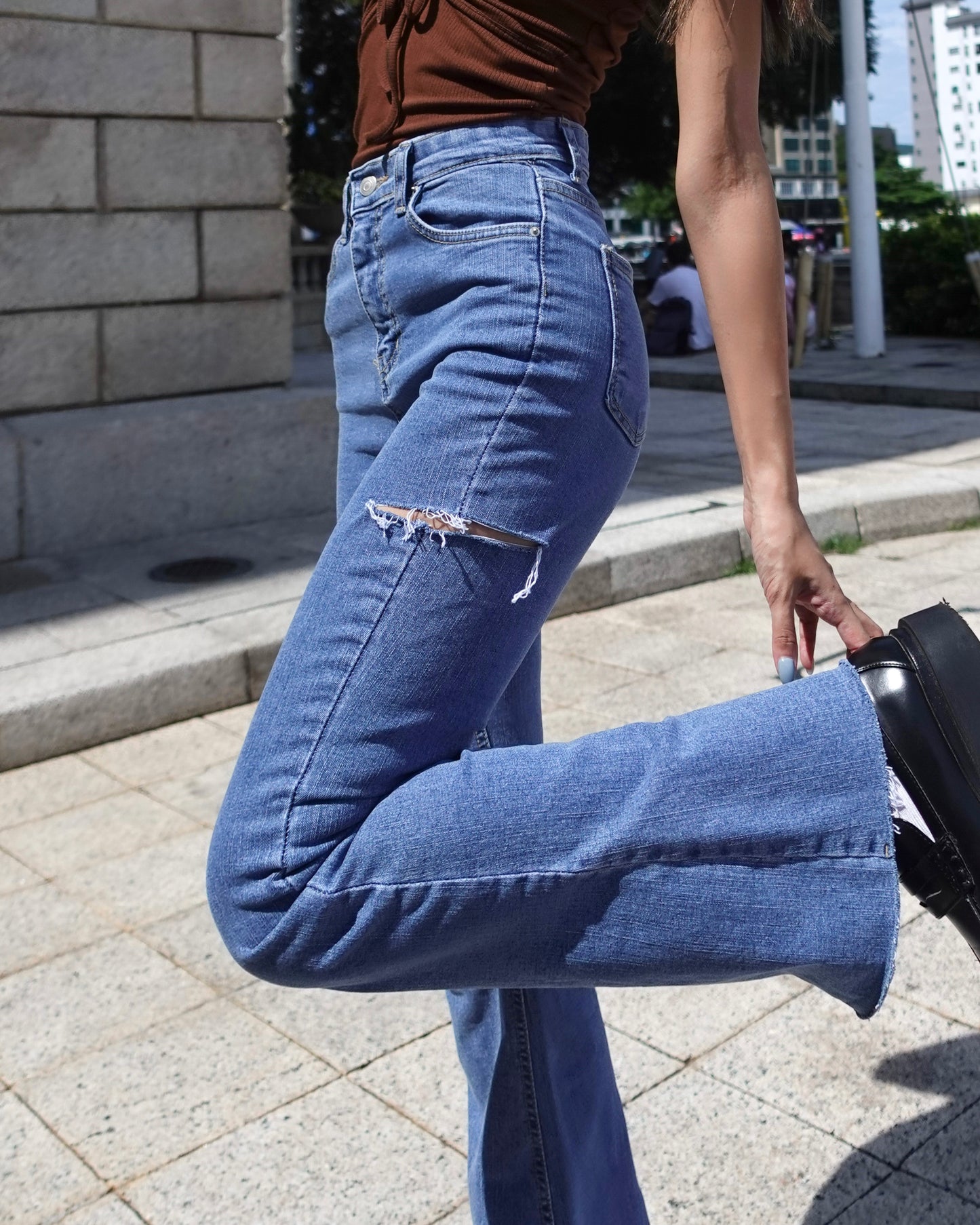 Distressed high-rise boot cut jeans