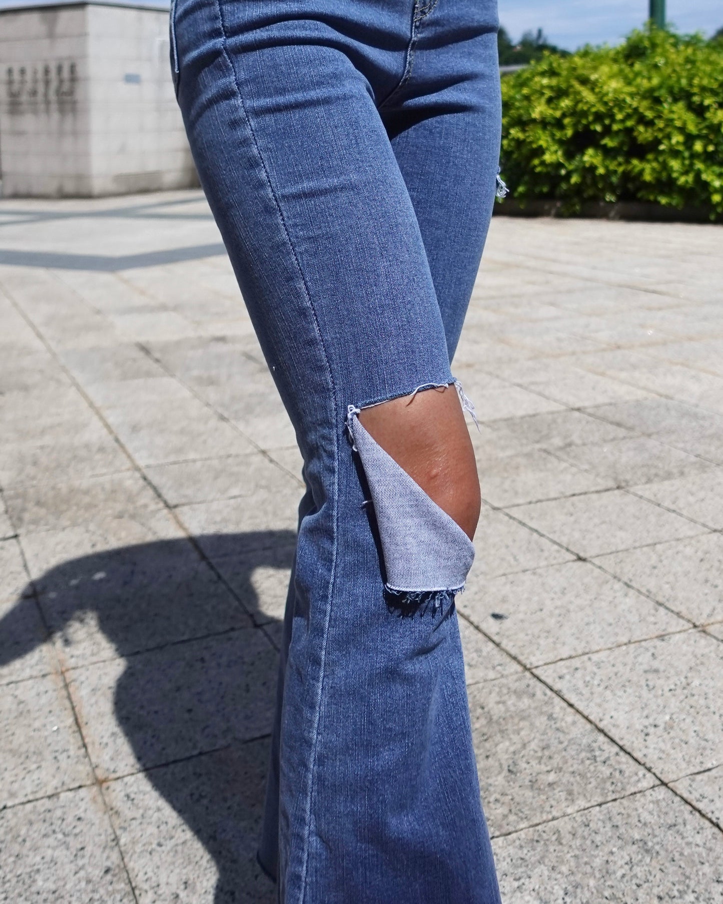 Distressed high-rise boot cut jeans