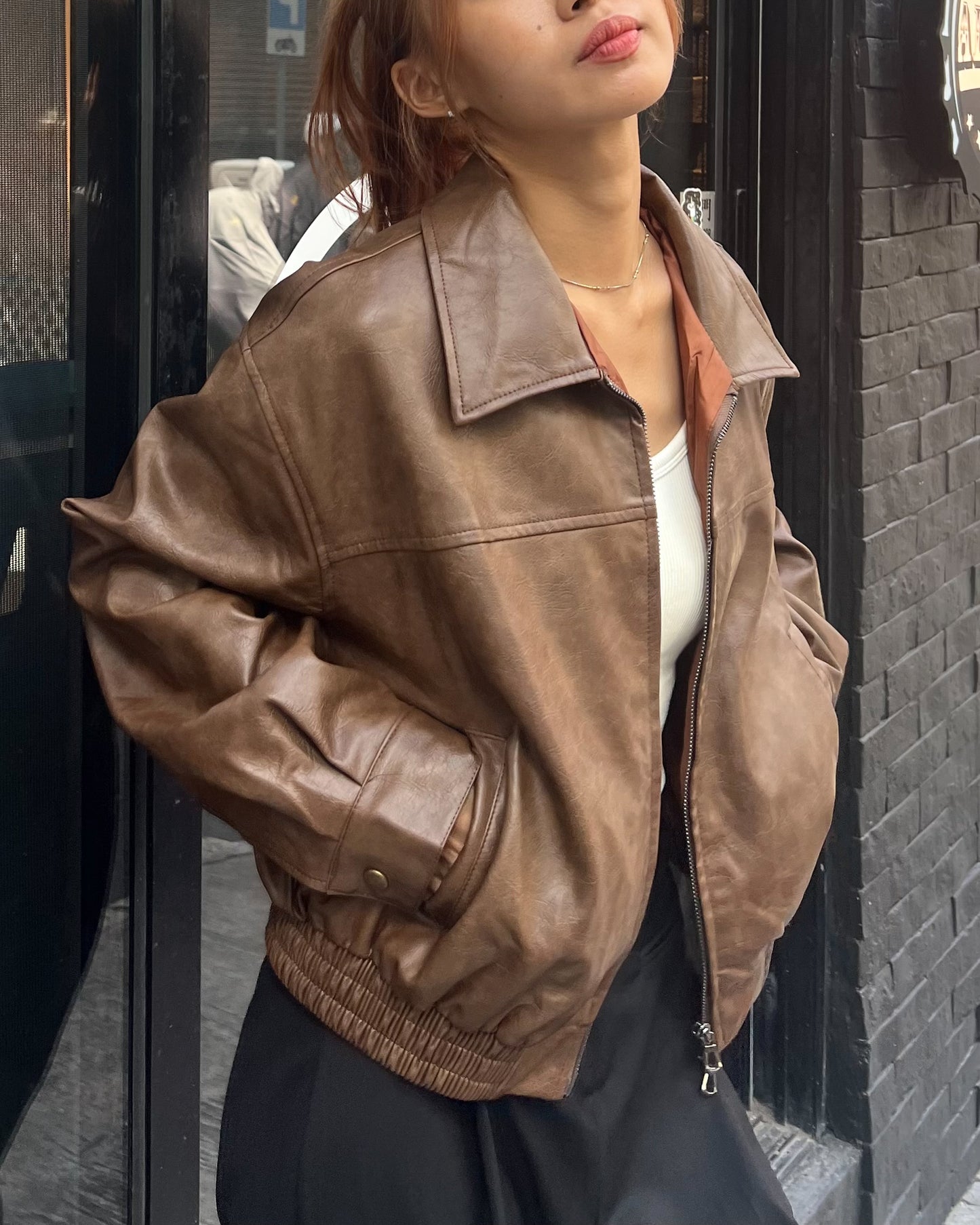 Washed faux leather bomber jacket
