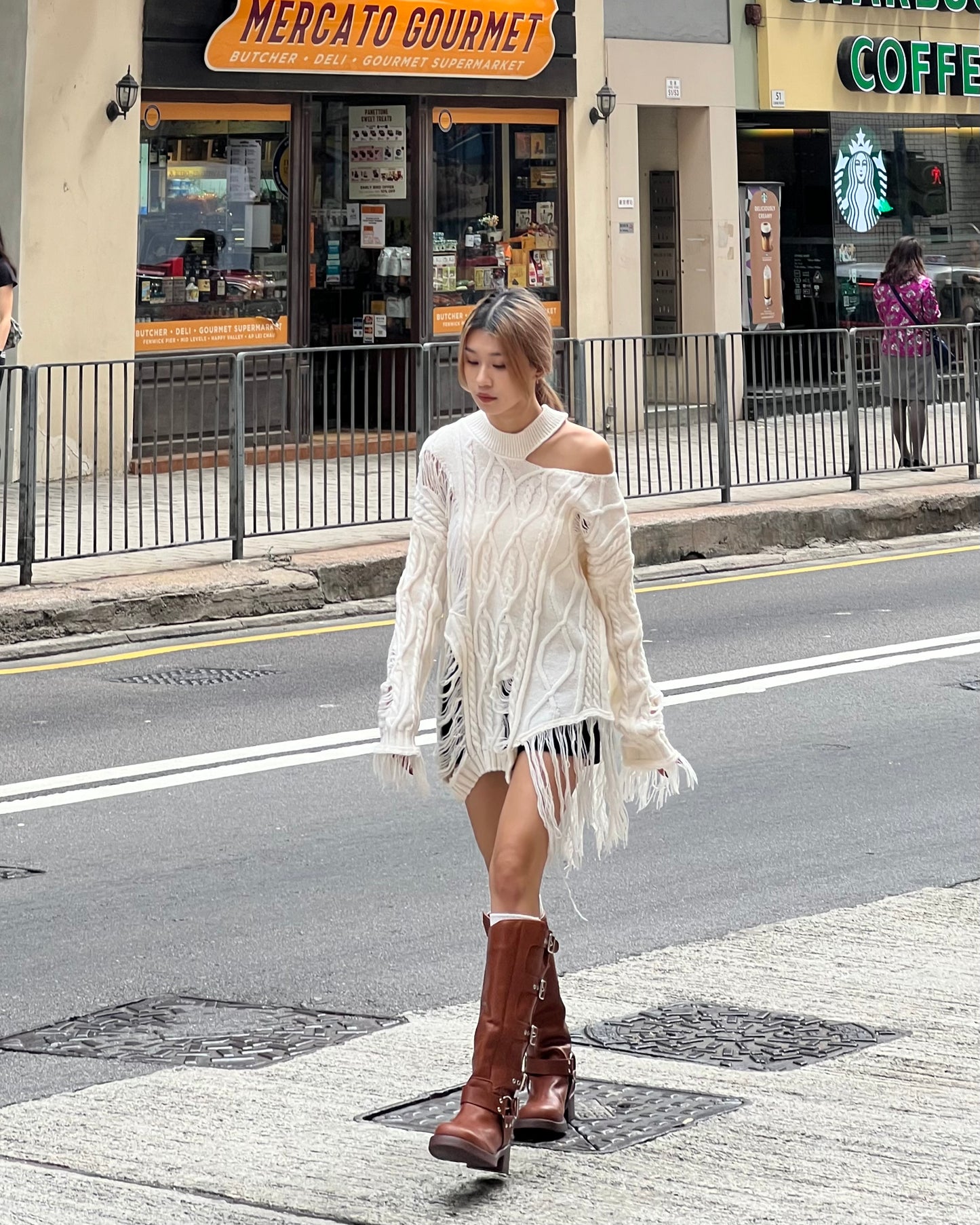 Cut out cable distressed sweater