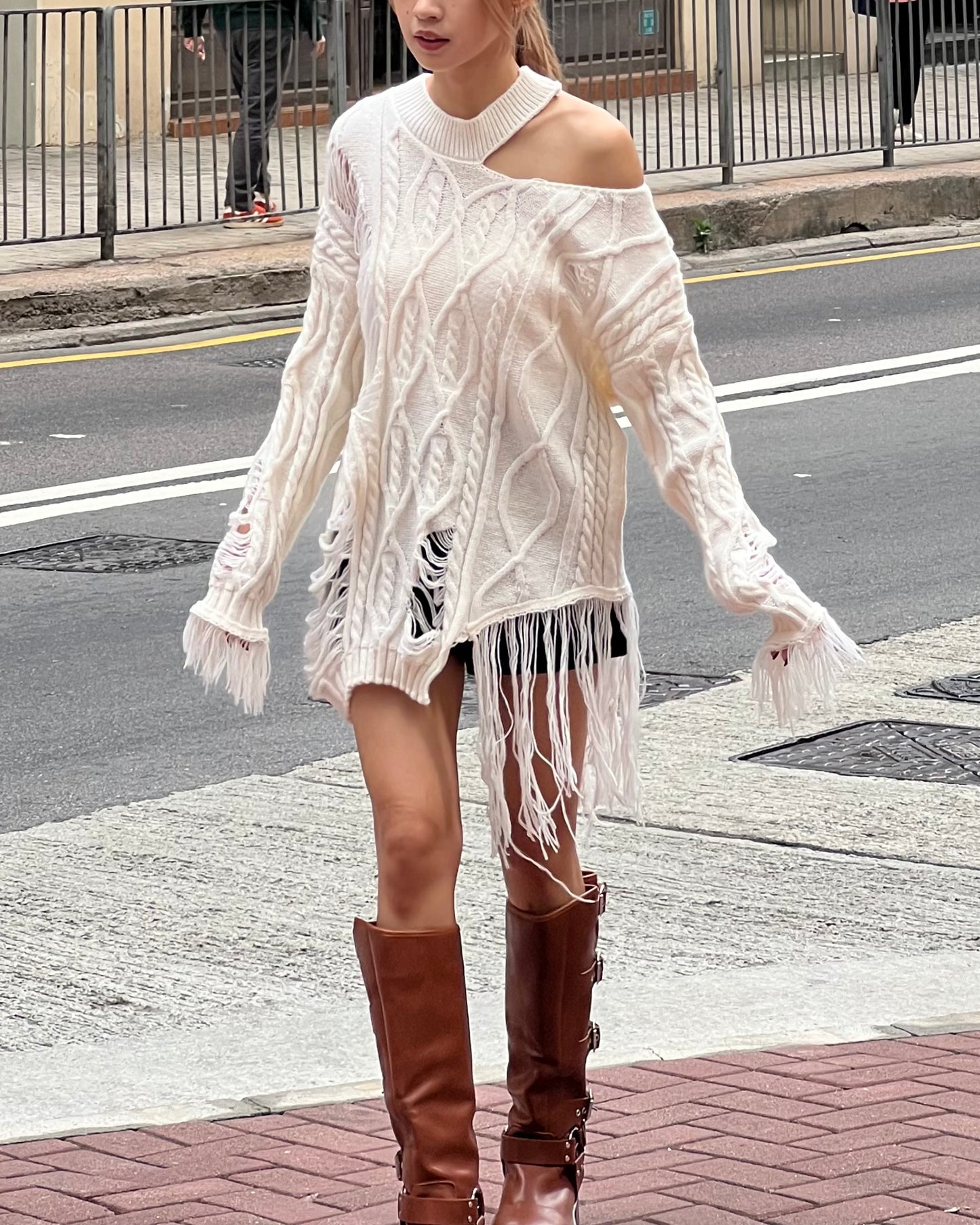 Cut out cable distressed sweater