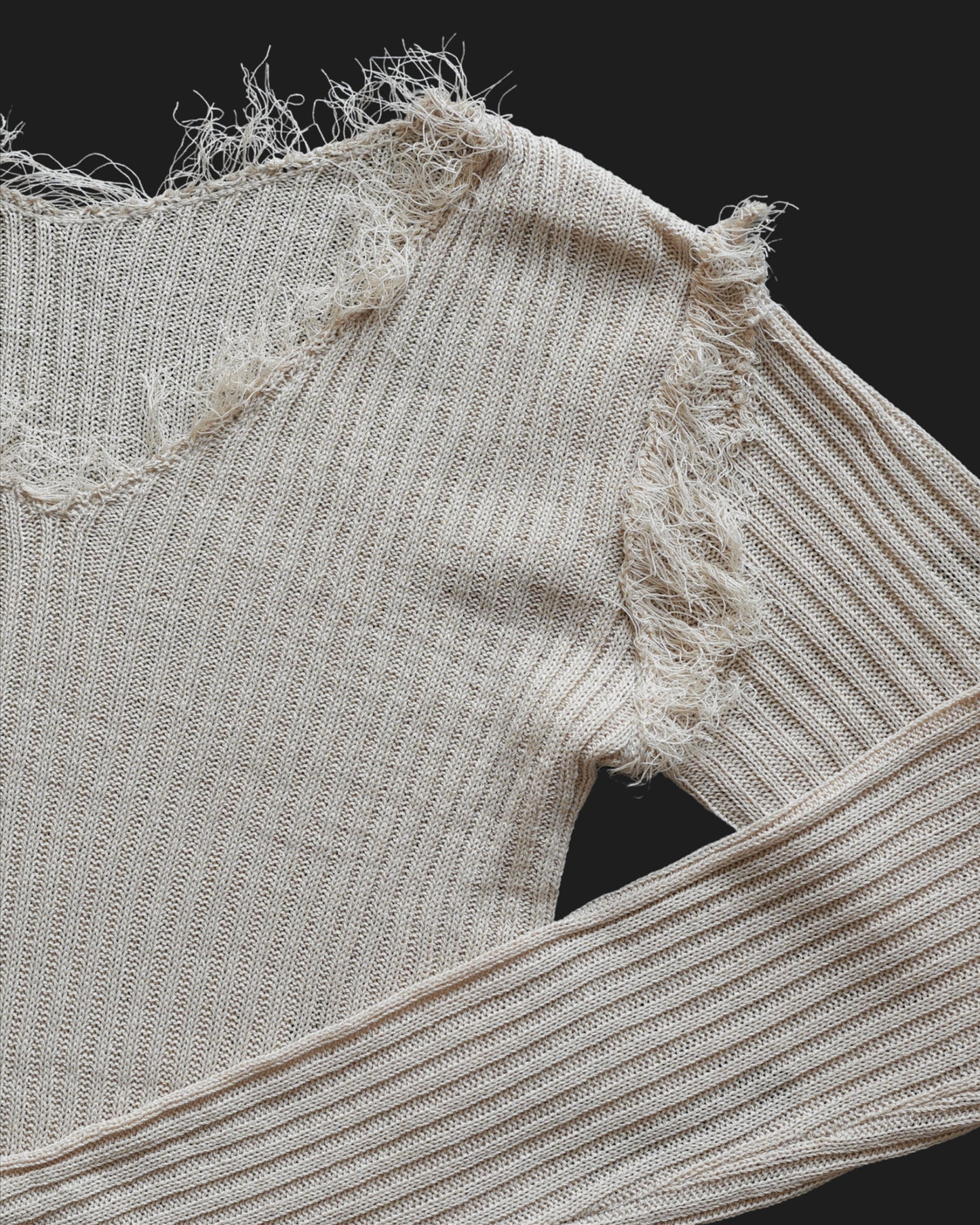 V-neck distressed knit top