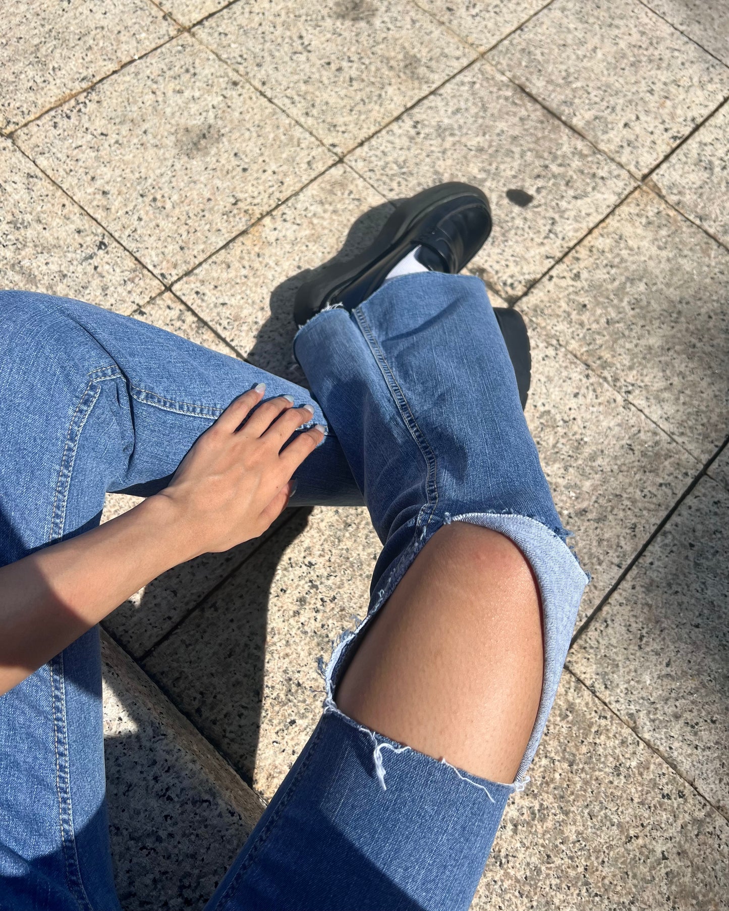 Distressed high-rise boot cut jeans