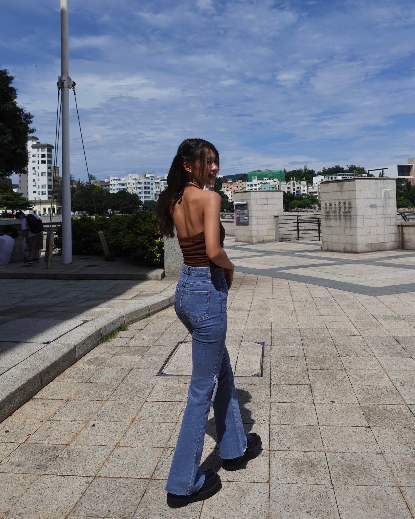 Distressed high-rise boot cut jeans