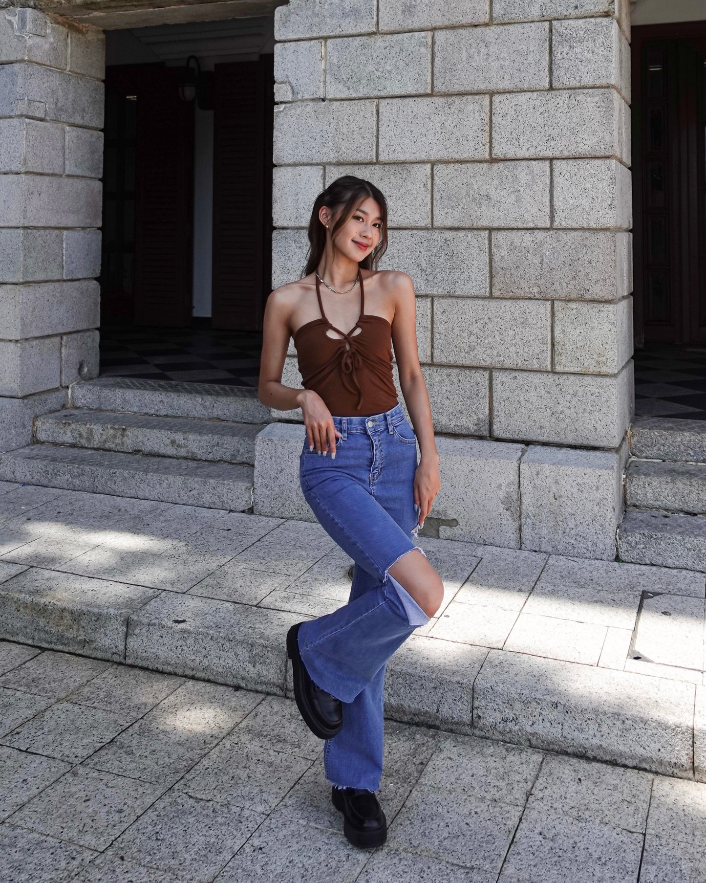 Distressed high-rise boot cut jeans