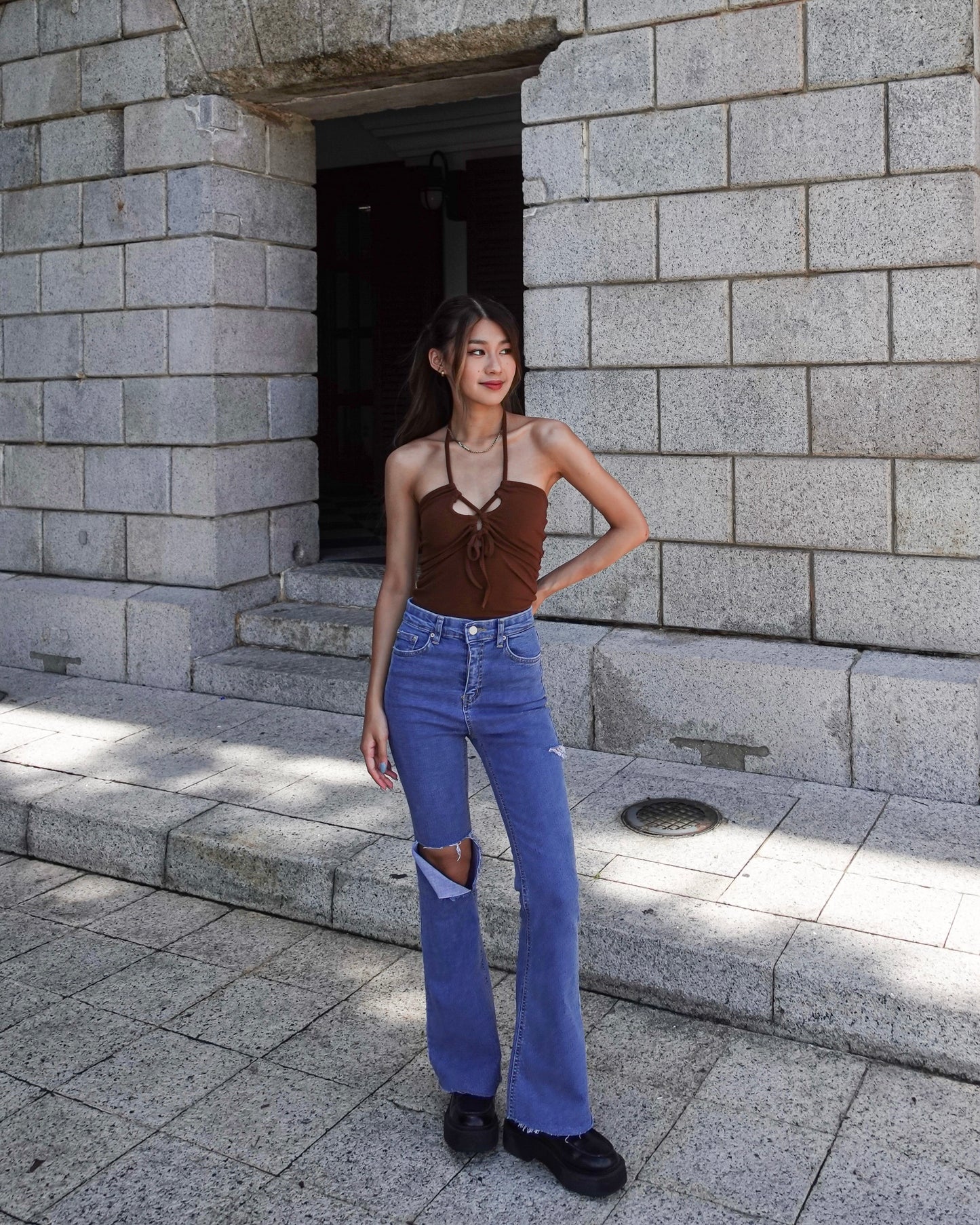 Distressed high-rise boot cut jeans