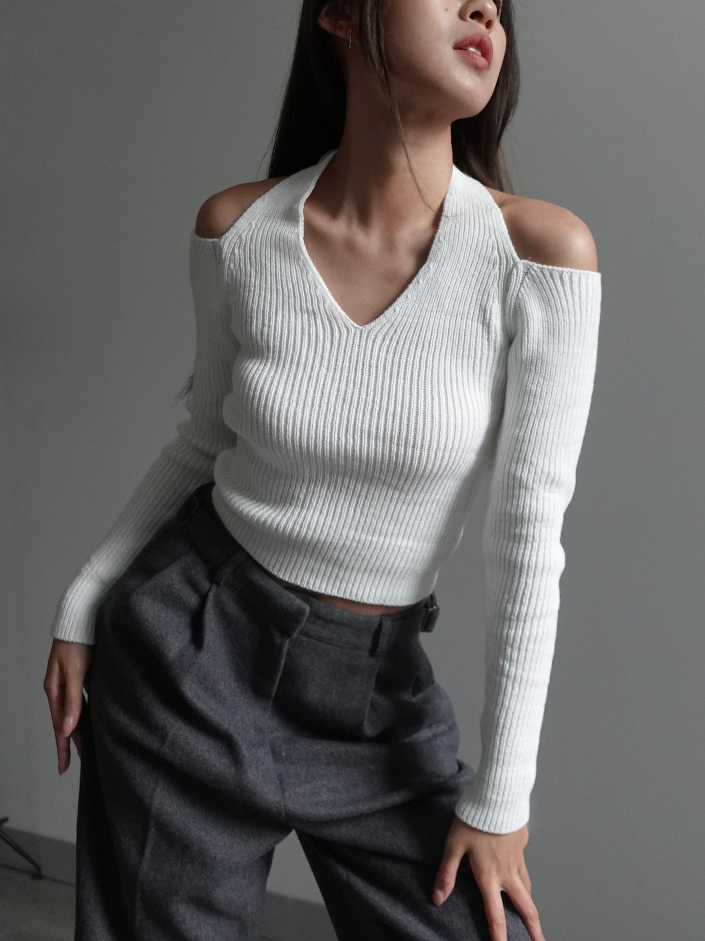 Ripped neck tie knit top