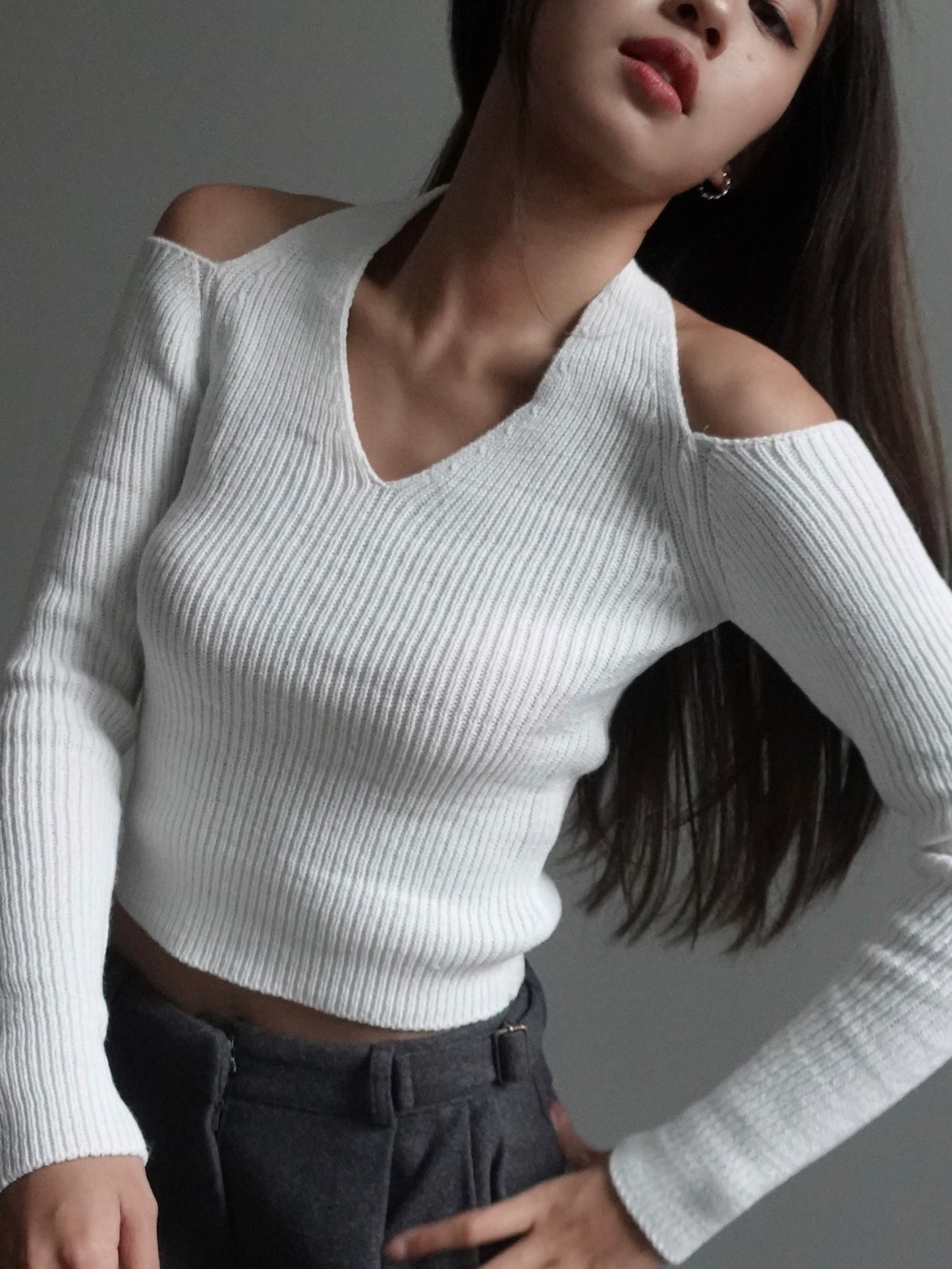 Ripped neck tie knit top