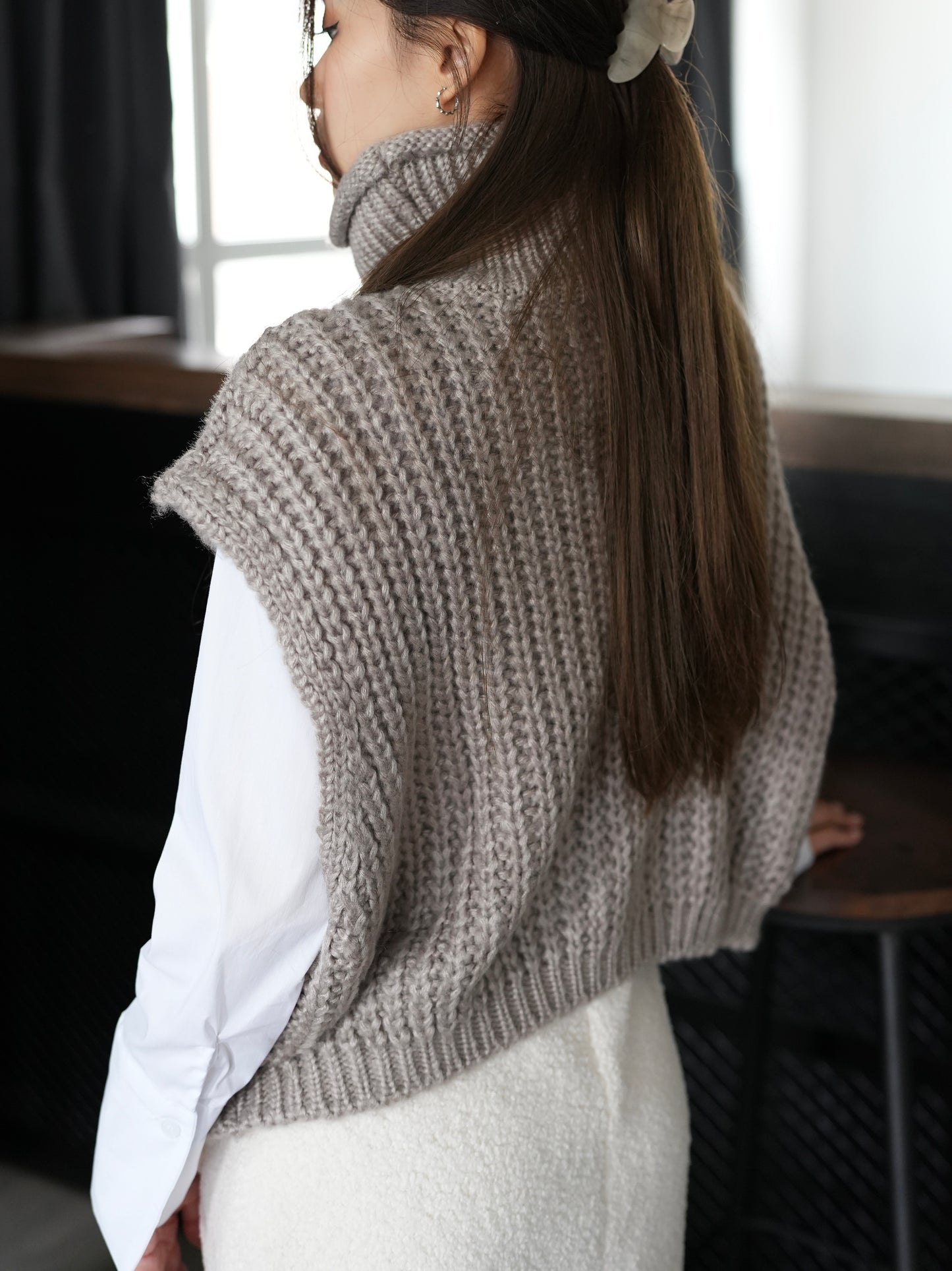 Turtle neck cable knit vest